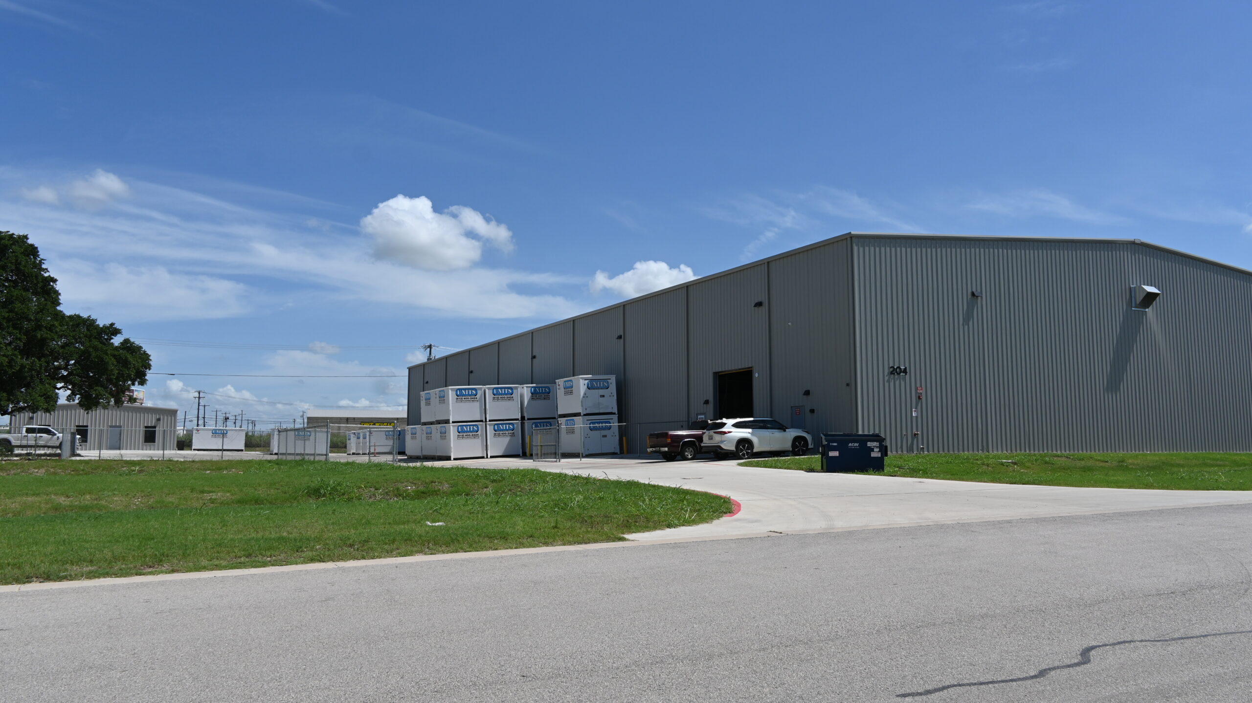 Grey metal warehouse building built by JB Realty and Development